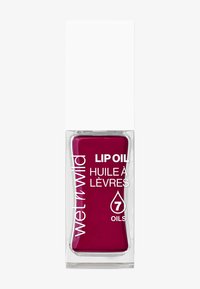 Lippenöl in einer transparenten Glasflasche mit einem quadratischen weißen Deckel, in einer tiefen Beerenfarbe, mit Text, der "7 Öle" und den Produktnamen hervorhebt.