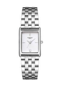 Hõbedane ristkülikuline kell tekstuuriga valge diali, kaks piklikku tunni markerit ja metallist link-ranneehted keeruka kudumisega.