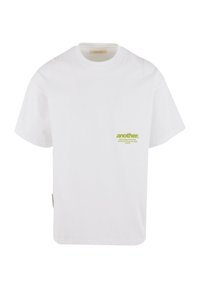 White cotton t-shirt with short sleeves, featuring a small green logo on the left chest. Simple, relaxed fit with a classic crew neck.