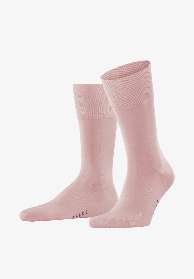 Helle rosa Socken aus glattem Material, mit geripptem Bündchen und nahtloser Zehenpartie, mit dem Aufdruck "FALKE" in lila an der Seite.