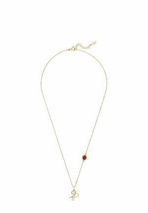 Gold chain necklace featuring a decorative script letter pendant and a red gemstone accent. The chain has a delicate, textured finish.