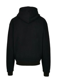 Zwarte hoodie met een relaxte fit, voorzien van een eenvoudige textuur en geribbelde manchetten en zoom. De achterkant toont minimale details.