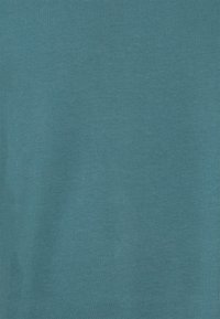 Solid teal fabric texture with subtle horizontal and vertical lines creating a soft, woven appearance.