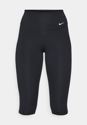 Nike svarte capri leggings har høy livlinje, glatt stretchstoff og en subtil logo detalj på fronten.