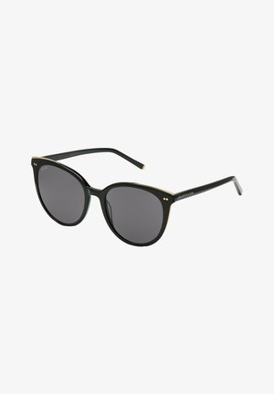 Schwarze Cat-Eye Sonnenbrille mit grauen Gläsern. Verfügt über eine goldfarbene Metallakzentuierung entlang der Augenbraue und zwei kleine dekorative Pins an jeder Seite des Rahmens.