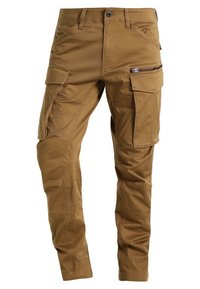 Khaki kalhoty typu cargo s několika kapsami, kapsou na zip na boku a zesíleným šitím; vyrobené z odolné látky s hladkou texturou.