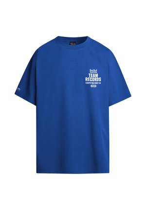 Blue cotton t-shirt featuring a crew neck, short sleeves, and front text: "Red Bull Racing TEAM RECORDS COMPETING SINCE '04."
