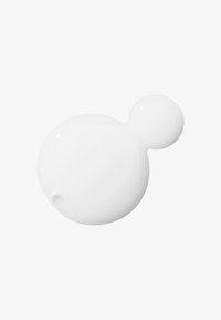 Oggetto ceramico rotondo, lucido e bianco, con un piccolo pomello rotondo sulla parte superiore; superficie liscia e bordi arrotondati.