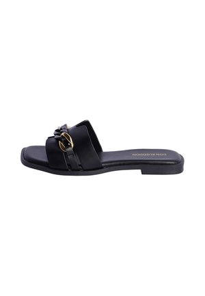 Sandalia plana negra tipo slide con puntera cuadrada, banda ancha con detalle trenzado y detalle de cadena dorada, etiquetada Don Algodon.