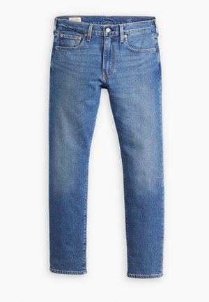 Blå denimjeans med rett snitt, fem lommer og subtile falminger. Har en klassisk knapp og glidelås lukking.