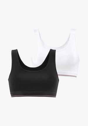 Zwei nahtlose Bralettes in Schwarz und Weiß, mit breiten Trägern, einem Rundhalsausschnitt und kontrastierenden gestreiften Bänderdetails am unteren Rand.