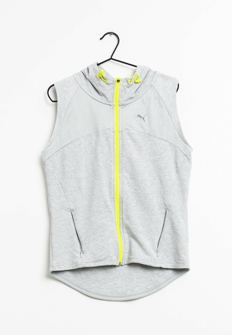Sudadera sin mangas gris con cremallera frontal, que presenta un diseño de malla en la parte superior y acentos en amarillo neón, incluyendo la cremallera y los cordones.