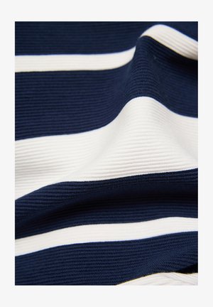 Marineblaue und weiße Stoff mit einer gerippten Textur, der abwechselnd horizontale Streifen in unterschiedlichen Breiten zeigt.