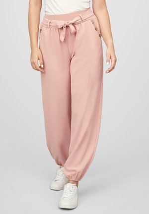 Light pink jogger pants with a tie waist, ribbed waistband, and tapered ankle cuffs, featuring button accents on the side pockets.