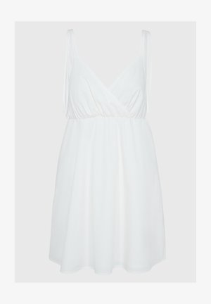 Hvit ermela kjole med V-hals, samlet midje og flytende skjørt. Laget av glatt stoff, med tynne skulderstropper.