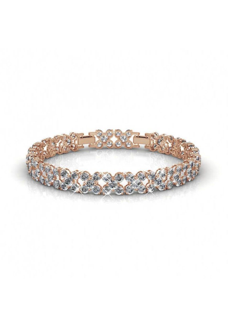 Bracciale in oro rosa con un design a catena abbellito da cristalli trasparenti di forme alternate, creando un aspetto scintillante e texturizzato.