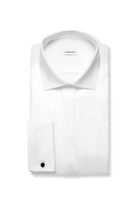 White folded formal dress shirt with a classic collar and black cufflink on the left cuff.