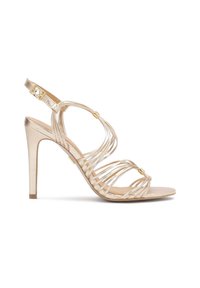 Strappy golden high-heeled sandal featuring metallic straps, an open toe, and a slender heel with a smooth texture and adjustable ankle buckle.