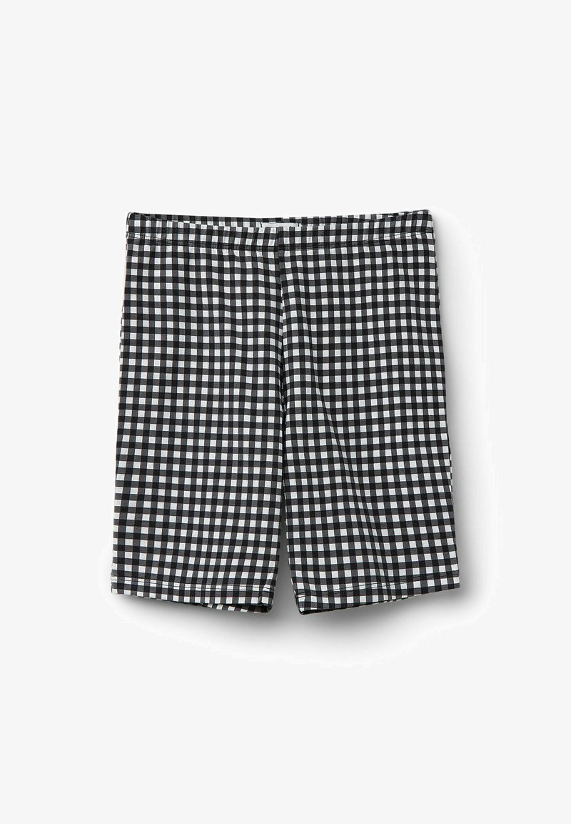 Shorts à carreaux noir et blanc avec une taille élastique, fabriqués en tissu léger, avec une coupe à mi-genoux et une texture lisse.