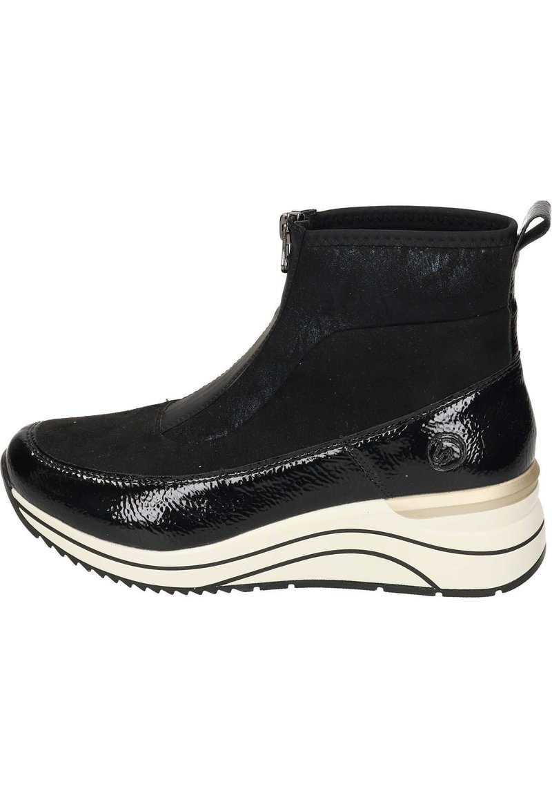 Bottines noires avec un dessus en vernis brillant et un tissu texturé mat. Comprend une fermeture éclair, un rembourrage et une semelle blanche à motifs.