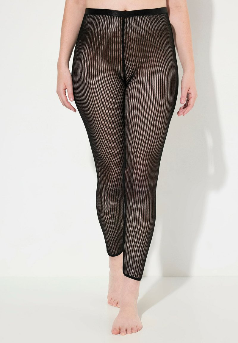 Leggings in rete neri con vita alta, caratterizzati da costine verticali e una textures trasparente. Fascia elastica in vita e design alla caviglia.