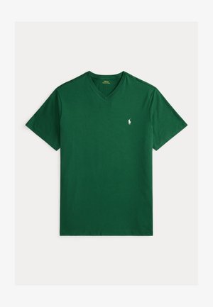 Vihreä lyhythihainen V-kaula-aukollinen Polo Ralph Lauren T-paita, jossa pieni valkoinen logo vasemmalla rinnassa, asetettuna tasaiselle valkoiselle taustalle.