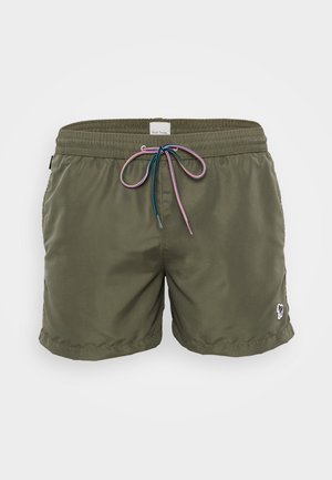 Pantaloni da bagno verde oliva realizzati in materiale leggero, con un elastico in vita e un cordoncino multicolore, oltre a una toppa con logo laterale.
