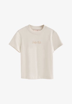 Korte mouwen, crèmekleurig t-shirt gemaakt van katoen, met een geborduurd "Polo Club" logo in lichtbruin, met een ronde halslijn en een zachte textuur.