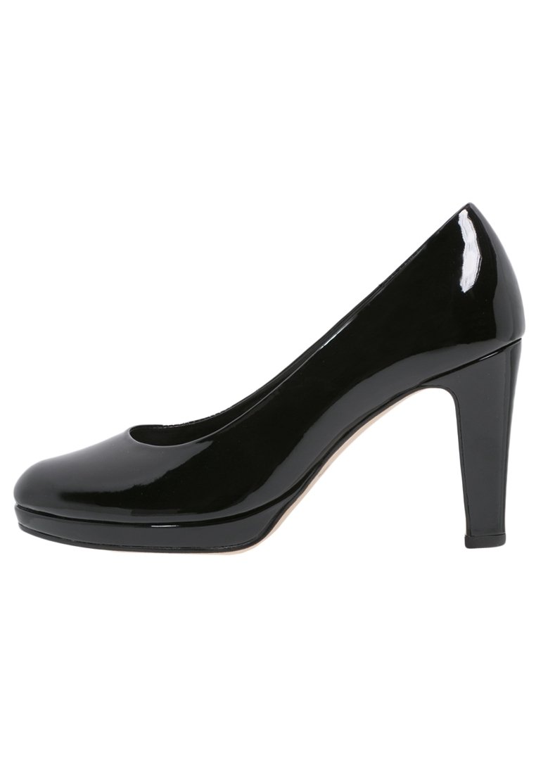 Escarpin pour femme en cuir verni noir, à talon haut, bout arrondi et talon moyennement épais, sur fond blanc.