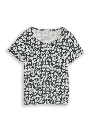 Blouse noire à manches courtes avec imprimé floral blanc, encolure ronde, et légers fronces au niveau de la taille et de la poitrine.