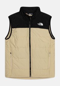 En pufferväst med svart överdel och beige underdel, dragkedjestängning, sidofickor och The North Face-logotyp på bröstet.