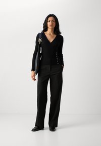 Scotch & Soda CORE EDIE - Housut - black