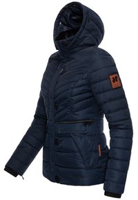 Navy blue puffer jacket with a hood, horizontal quilted design, button closure, and two front pockets. Features a logo patch on the sleeve.