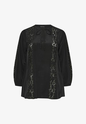 Blusa nera a maniche lunghe in tessuto liscio, con dettagli di ricamo a taglio e accenti metallici lungo la parte anteriore e le maniche.
