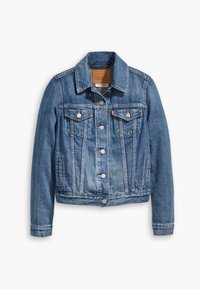 Blå denimjacka med klassisk skärning, knäppning med knappar, två bröstfickor och en tanfärgad etikett i nacken. Har en lätt urtvättad yta.