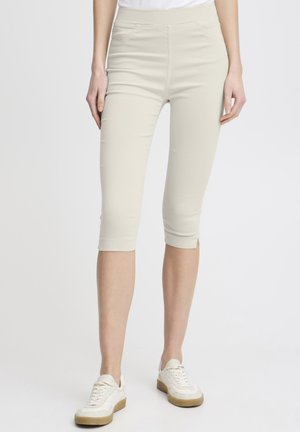 Beige capri broeken van een rekbare katoenmix, met een aansluitend ontwerp, een elastische tailleband en een cropped lengte boven de enkel.
