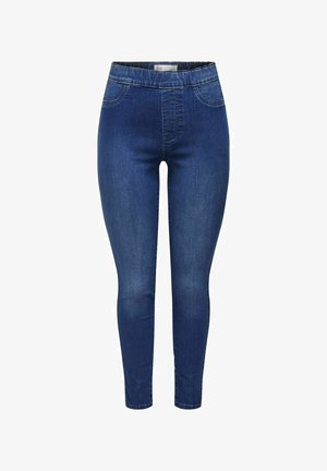 Tumedates sinised skinny teksad, millel on siledat tekstiilist valmistatud materjal, kõrge vöökoht, kaks esimist taskut ja kitsenev sääre disain.