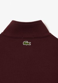 Lacoste Felpa - bordeaux bzd