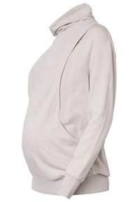 Beżowy sweter ciążowy z kołnierzem typu funnel, luźny krój, bocznym rozcięciem i ściągaczami. Wykonany z miękkiej tkaniny bawełnianej.