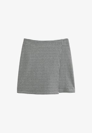 Black and white houndstooth patterned A-line mini skirt with a side slit, displayed on a white background.