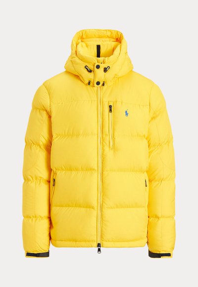 Yellow puffer jacket with a hood, zippered front and side pockets, featuring quilted texture and a small logo on the chest.