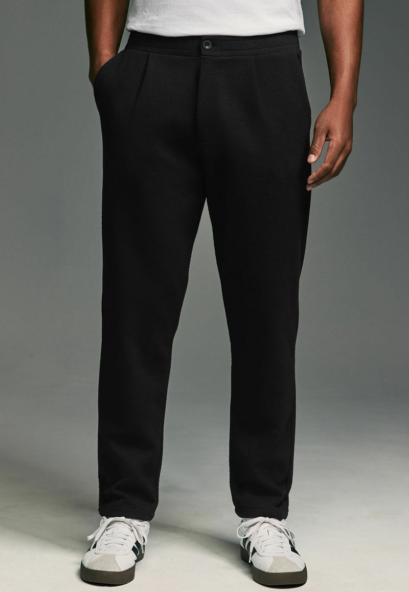 Next TEXTURED REGULAR FIT - Pantaloni - black
