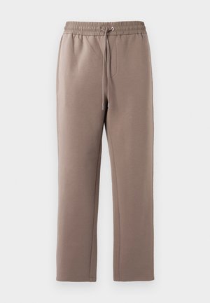 Brown, mid-rise sweatpants made of soft fabric, featuring an elastic waistband with a drawstring, side pockets, and straight legs.