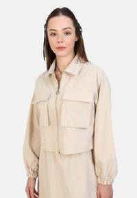 Modanisa BENIN SET - Veste légère - beige