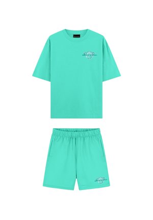 Turquoise short-sleeve T-shirt and matching shorts set with small animal face print on the chest and shorts front.