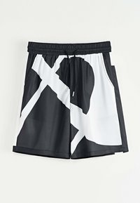 Shorts de bain noirs et blancs avec un design graphique, taille élastique avec cordon de serrage, deux poches latérales et texture de tissu lisse.