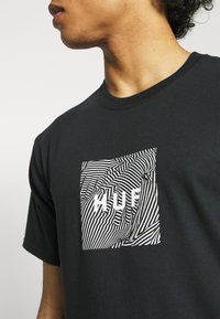 HUF Triko s potiskem - black
