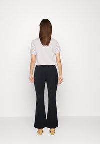 MARCIANO BY GUESS Calças - schwarz