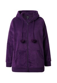 Haut à capuche zippé en polaire violet avec deux poches avant, cordons de serrage se terminant par des pompons et une capuche. Texture douce avec des poignets et un ourlet côtelés.