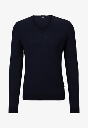Maglione blu navy a scollo a V realizzato in morbido tessuto a maglia, con maniche lunghe e polsini e orlo a coste. Presenta un'etichetta con il logo del marchio all'interno del collo.